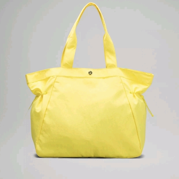 lululemon athletica Handbags - Lululemon Side-Cinch Shopper Tote Bag in Bright Yellow Durable Easy To Clean NWT